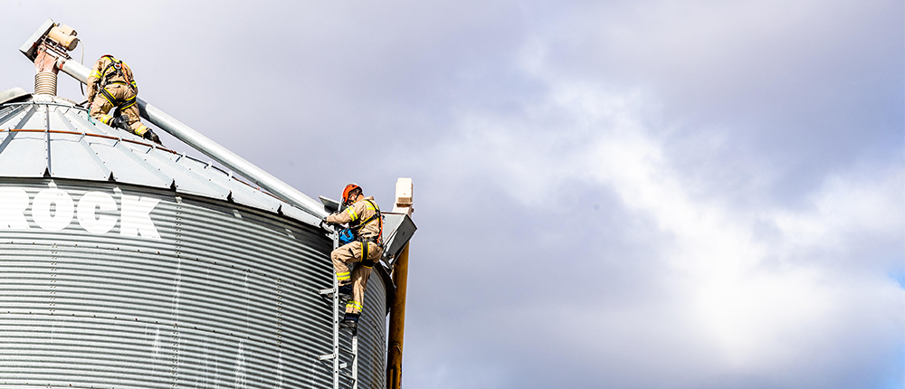 Climbing down a grain bin