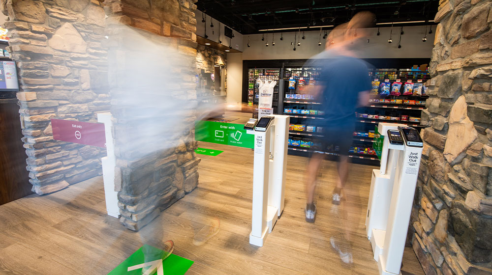 Man enters a contactless convenience store.
