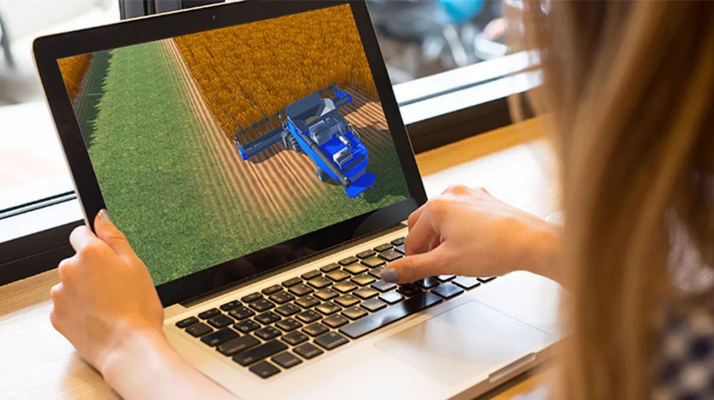 Woman looking at laptop screen