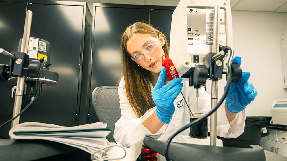 Young woman working in a laboratory.