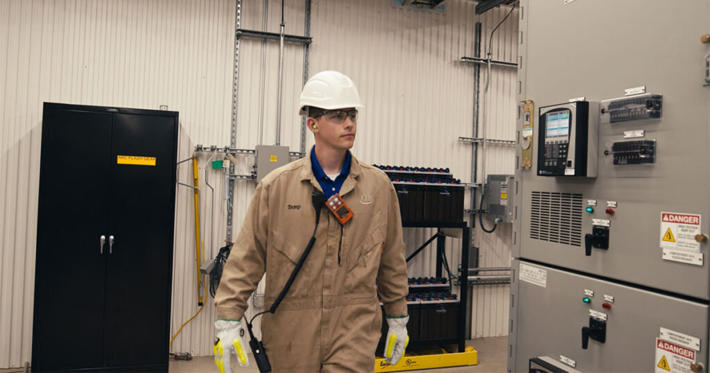 man in refinery control room