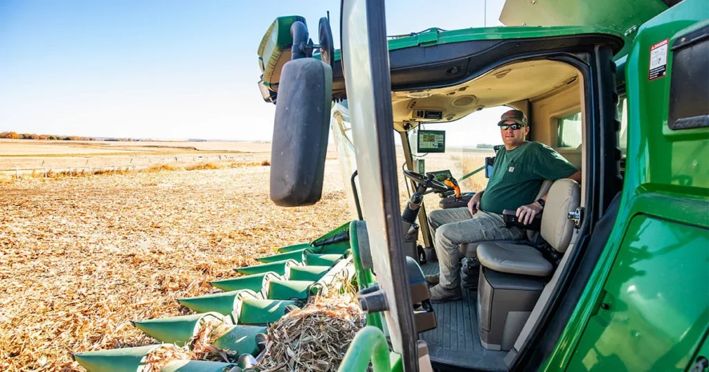 Man sitting in a combine