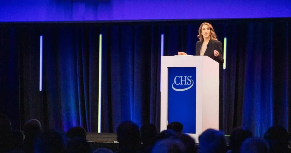 Olivia Nelligan speaking on stage at the 2025 CHS Annual Meeting