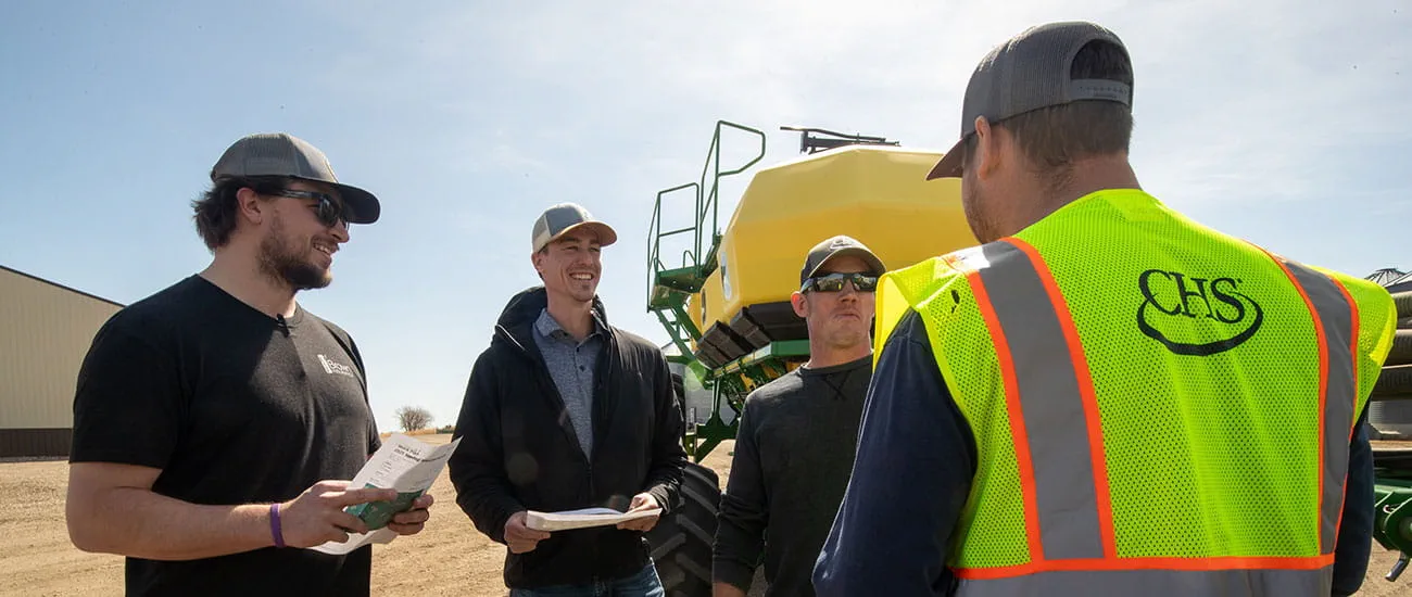 Talking in front of a sprayer